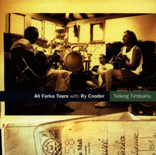 the album cover for Toumani Diabate - Talking Timbuktu [Import]