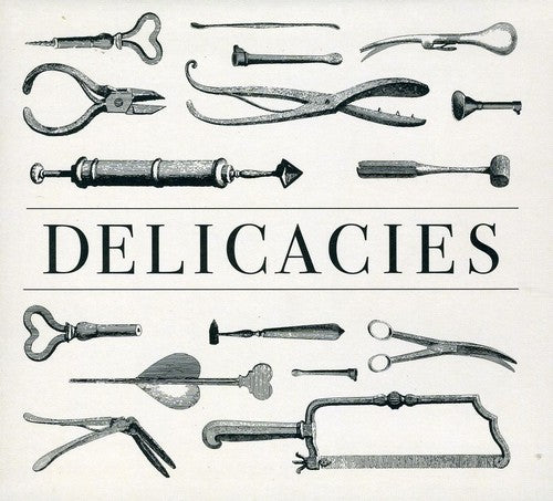 the album cover for Simian Mobile Disco - Delicacies