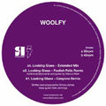 the album cover for Woolfy - Looking Glass