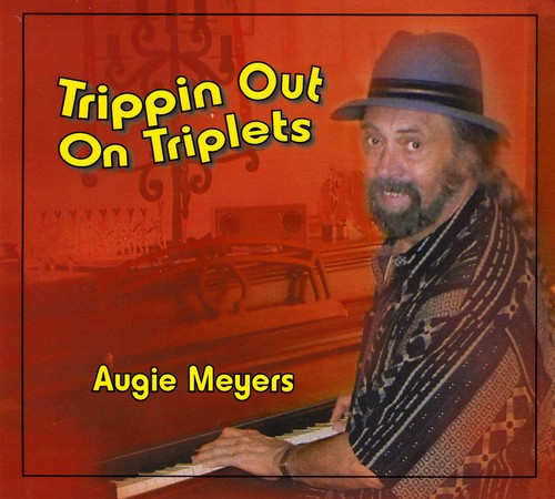 the album cover for Augie Meyers - Trippin Out on Triplets