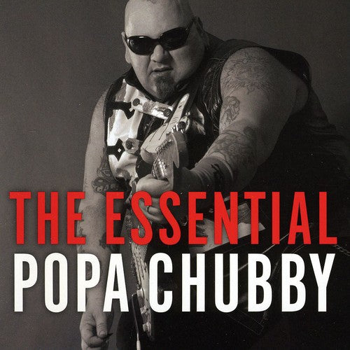 the album cover for Popa Chubby - The Essential Popa Chubby