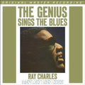the album cover for Ray Charles - The Genius Sings The Blues