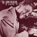 the album cover for Amos Milburn - Lets Rock Awhile 1946-54