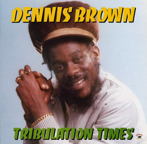 the album cover for Dennis Brown - Tribulation Times