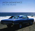 the album cover for Jacek Sienkiewicz - On the Road
