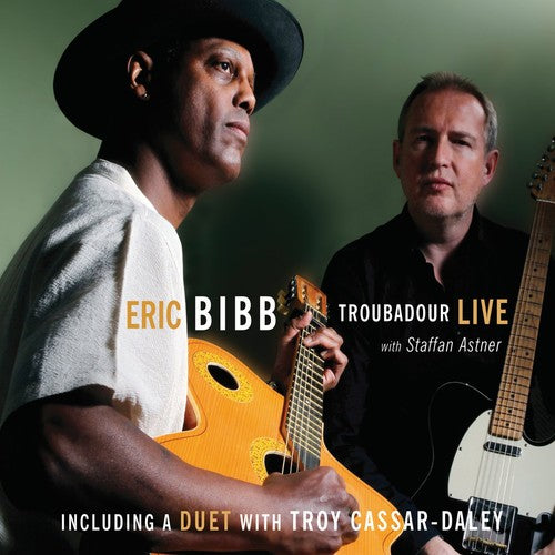 the album cover for Eric Bibb - Troubadour Live!
