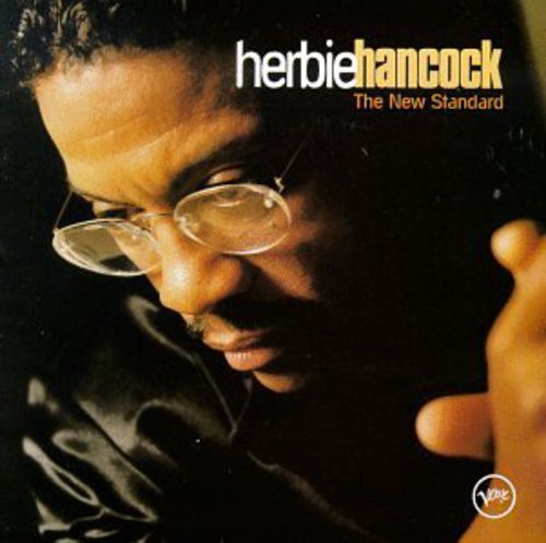 the album cover for Herbie Hancock - New Standard
