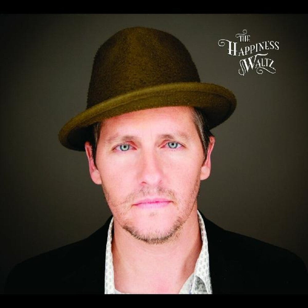 the album cover for Josh Rouse - The Happiness Waltz