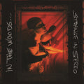 the album cover for In The Woods - Strange In Stereo [Limited Edition] [Colored Vinyl] [180 Gram]