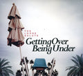 the album cover for Loose Salute - Getting Over Being Under
