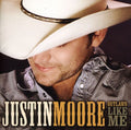the album cover for Justin Moore - Outlaws Like Me