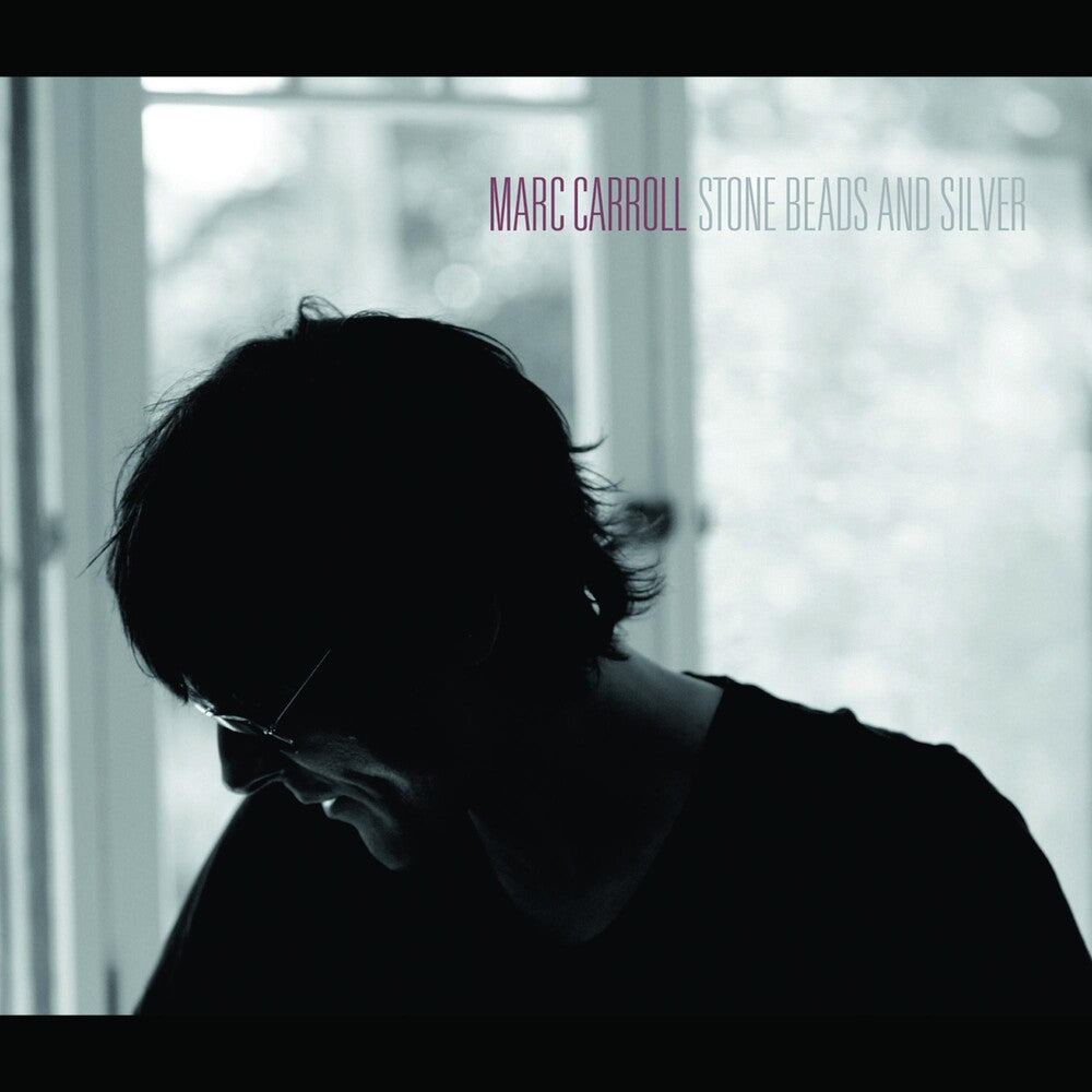 the album cover for Marc Carroll - Stone Beads and Silver