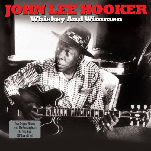 the album cover for John Lee Hooker - Whiskey & Wimmen [180 Gram]