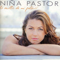 the album cover for Pastori Nina - La Orilla De Mi Fuego [Import]