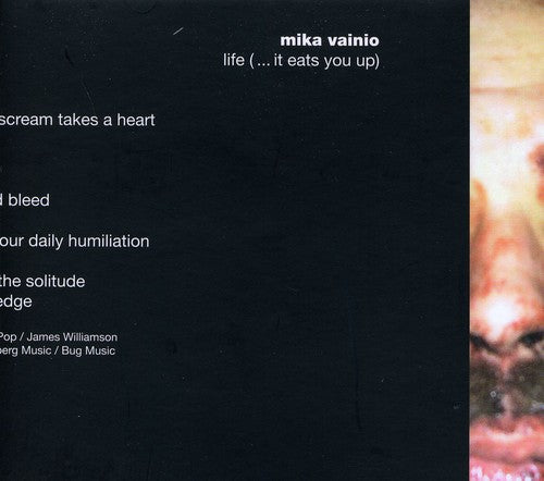 the album cover for Mika Vainio - Life (...It Eats You Up)