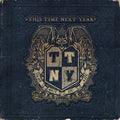 the album cover for This Time Next Year - Drop Out Of Life