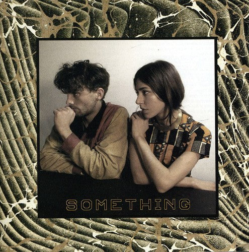 the album cover for Chairlift - Something