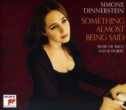 the album cover for Simone Dinnerstein - Something Almost Being Said: Music of Bach & Schub