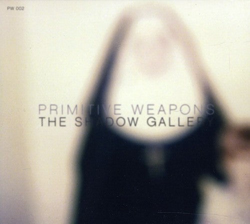the album cover for Primitive Weapons - The Shadow Gallery