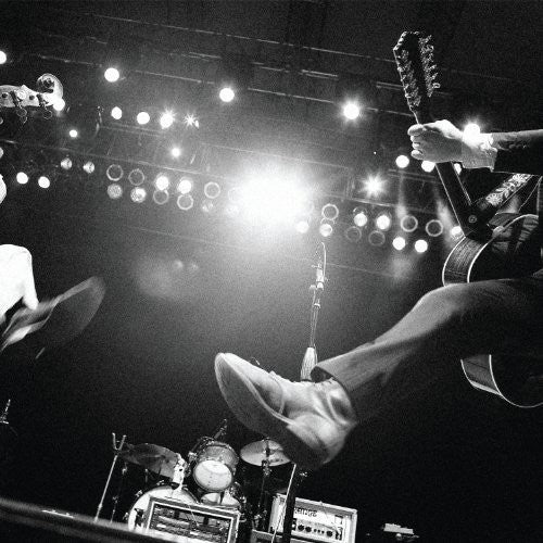 the album cover for The Decemberists - We All Raise Our Voices To The Air: Live Songs 04.11.08