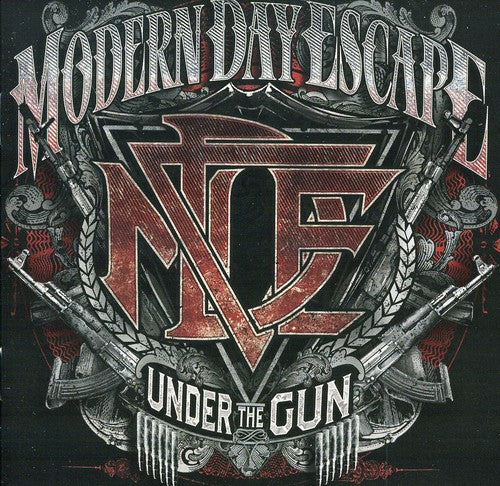 the album cover for Modern Day Escape - Under the Gun