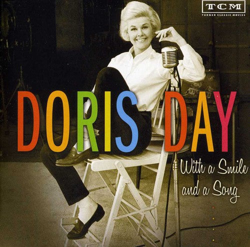 the album cover for Doris Day - With A Smile and A Song