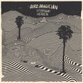 the album cover for Mrs. Magician - Strange Heaven