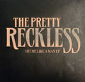 the album cover for The Pretty Reckless - Hit Me Like A Man