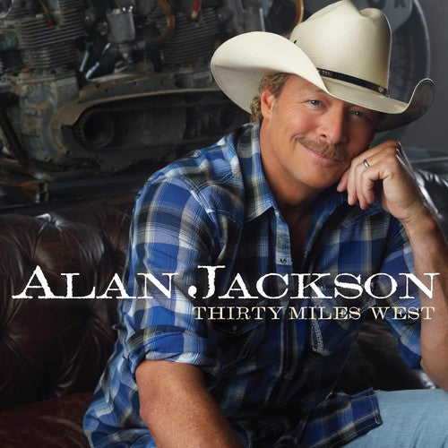 the album cover for Alan Jackson - Thirty Miles West