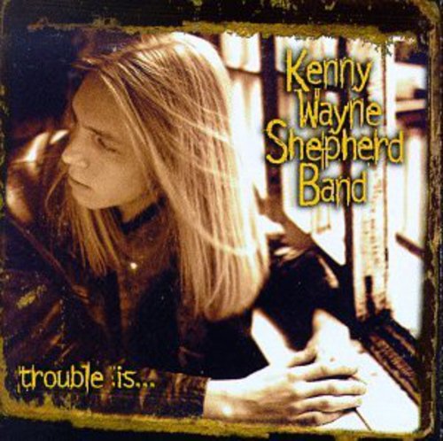 the album cover for Kenny Wayne Shepherd - Trouble Is