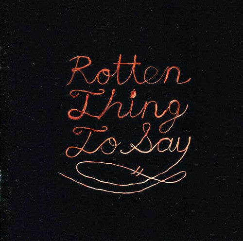 the album cover for Burning Love - Rotten Thing to Say