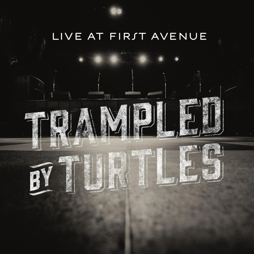 the album cover for Trampled By Turtles - Live At First Avenue [w/DVD]