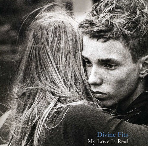 the album cover for Divine Fits - My Love Is Real/I Was Born In A Laundromat