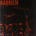 the album cover for Karriem Riggins - Alone