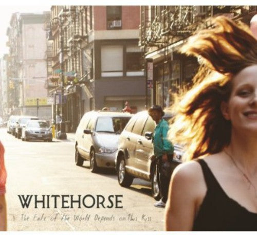 the album cover for Whitehorse - Fate of the World Depends on This Kiss