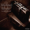 the album cover for Michael Bram - Suitcase in the Hall