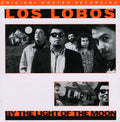the album cover for Los Lobos - By The Light Of The Moon