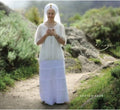the album cover for Snatam Kaur - Evening Prayer: Kirtan Sohila