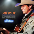 the album cover for Jon Wolfe - It All Happened in a Honky Tonk