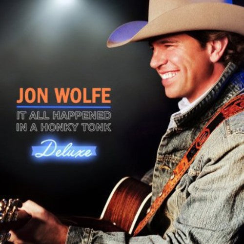 the album cover for Jon Wolfe - It All Happened in a Honky Tonk