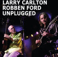 the album cover for Larry Carlton - Unplugged