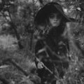 the album cover for Grouper - Dragging a Dead Deer Up a Hill