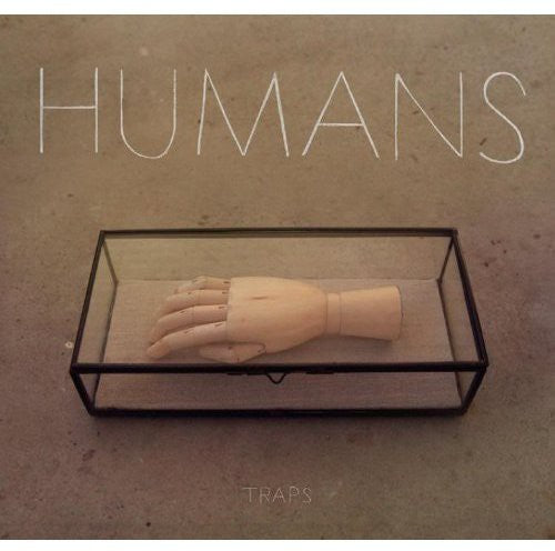 the album cover for The Humans - Traps