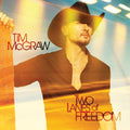 the album cover for Tim McGraw - Two Lanes Of Freedom [Deluxe]