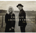 the album cover for Emmylou Harris & Rodney Crowell - Old Yellow Moon