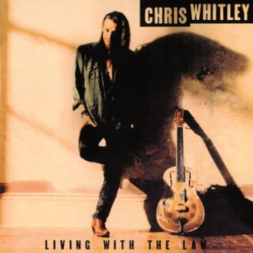 the album cover for Chris Whitley - Living With The Law [Import]