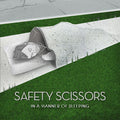 the album cover for Safety Scissors - In a Manner of Sleeping