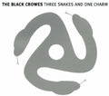 the album cover for The Black Crowes - Three Snakes & One Charm [Import]