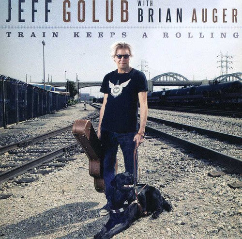 the album cover for Jeff Golub - Train Keeps a Rolling
