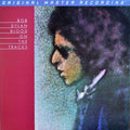 the album cover for Bob Dylan - Blood On The Tracks [Limited Edition] [180 Gram]